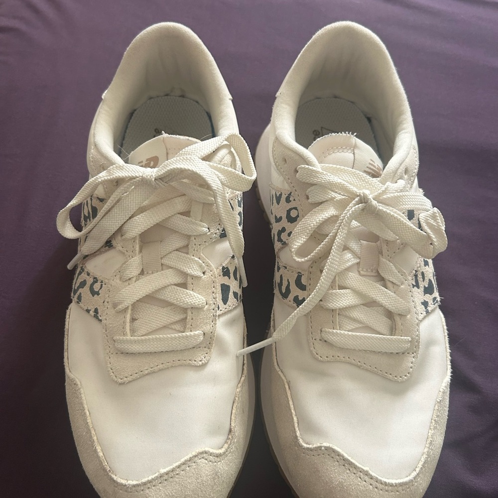 New Balance White and Black Leopard Print Sneakers